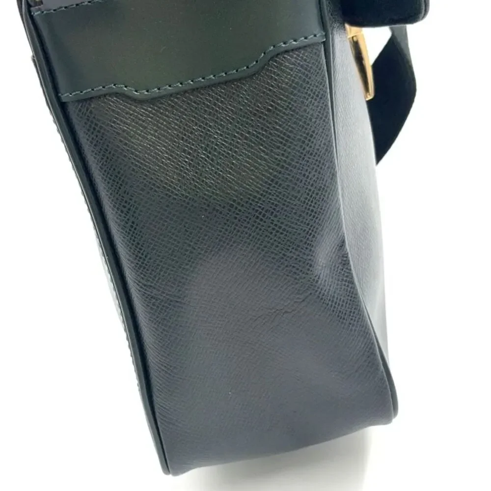 Louis Vuitton Yaranga Taiga Leather Shoulder Bag